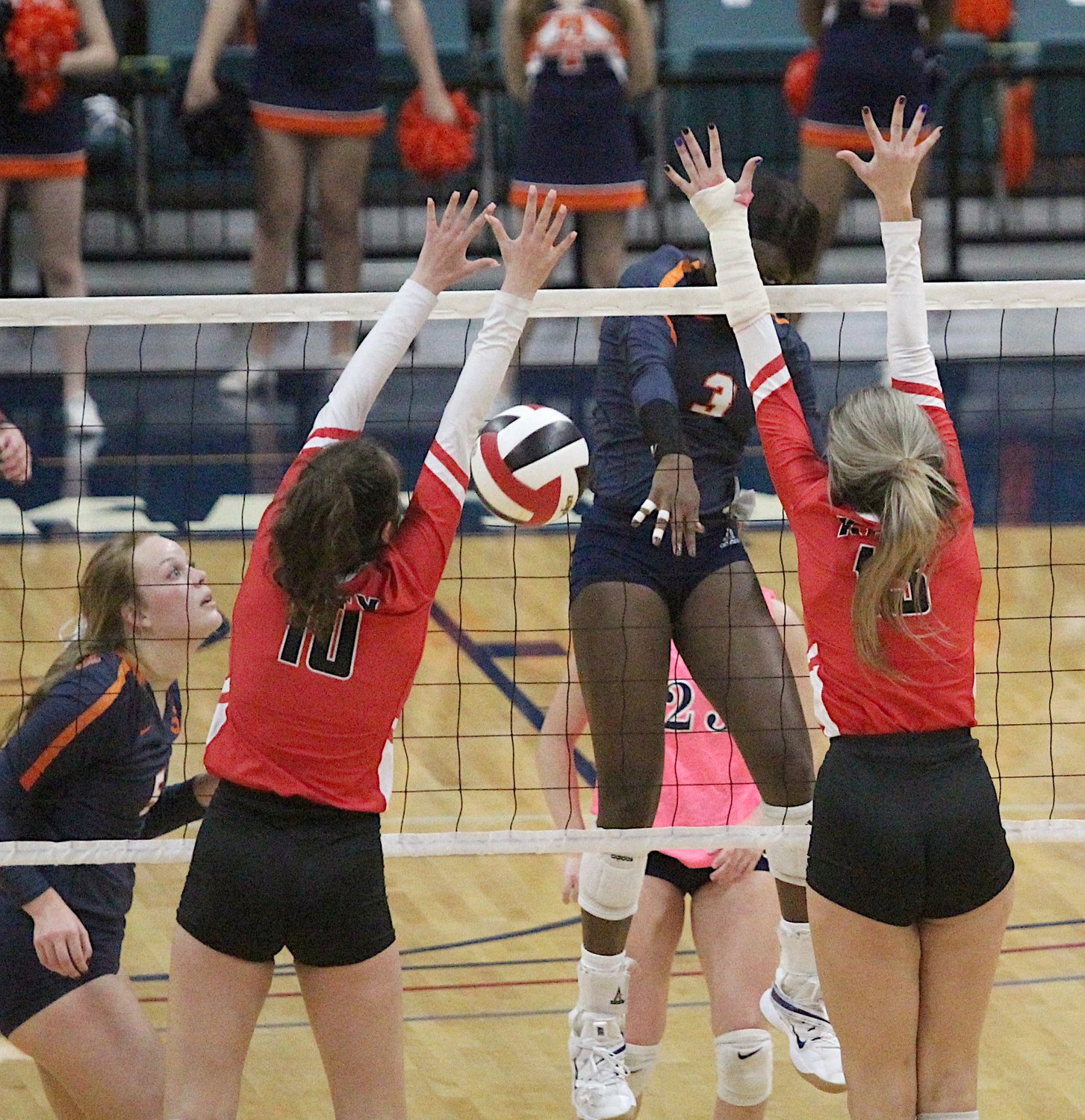 Seven Lakes senior Mayo Olibale (3) puts down a point during the Spartans' 3-1 win over district rival Katy High in their Class 6A Region III final on Friday, Dec. 4, at the Merrell Center.